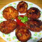 Crispy maggi cutlet served in a plate with tomato ketchup