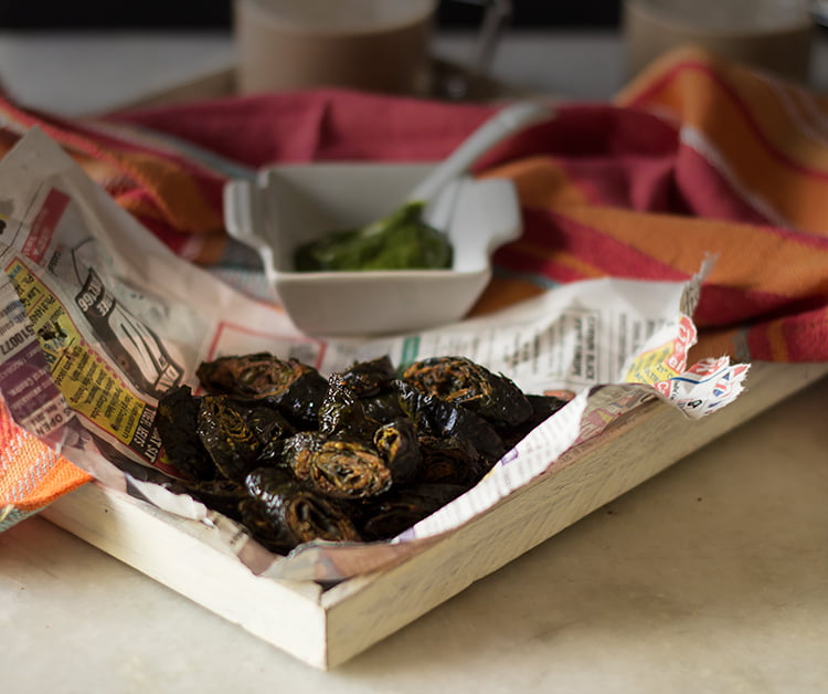 Freshly fried Patode ki Pakori draining on paper towels to remove excess oil