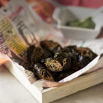 Crispy Arbi Ke Patte Ke Pakode, golden brown in color placed in a tray