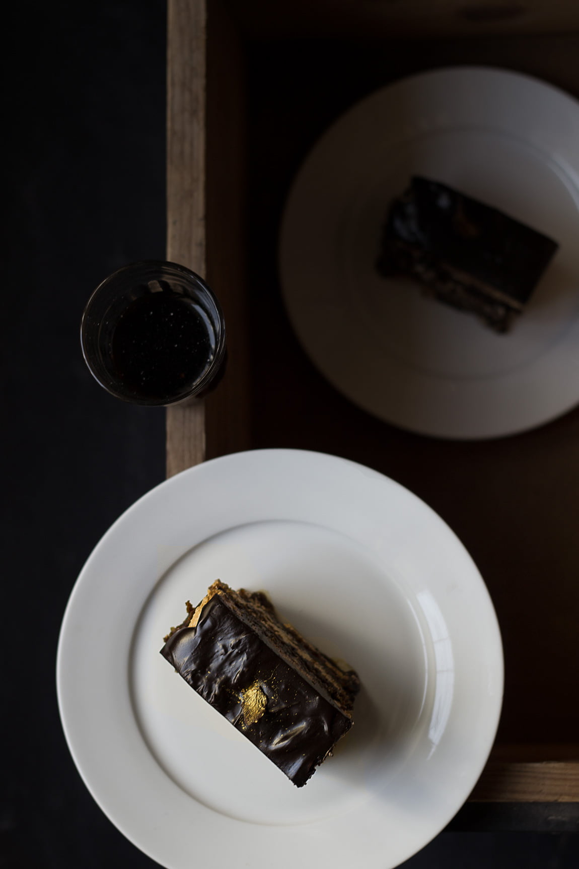 Close-up of the Eggless French Opera Cake slice, showcasing the distinct layers