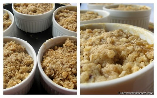 A bowl of warm apple pear crumble with a dollop of whipped cream