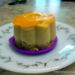 No-bake mango cheesecake topped with fresh mango jam