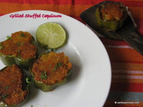 Close-up of grilled stuffed bell peppers filled with a colorful veggie mix