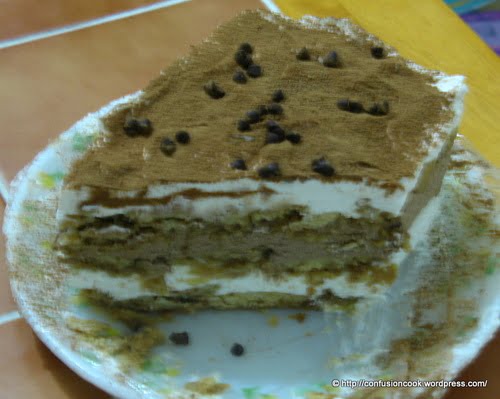 A slice of eggless tiramisu served on a plate