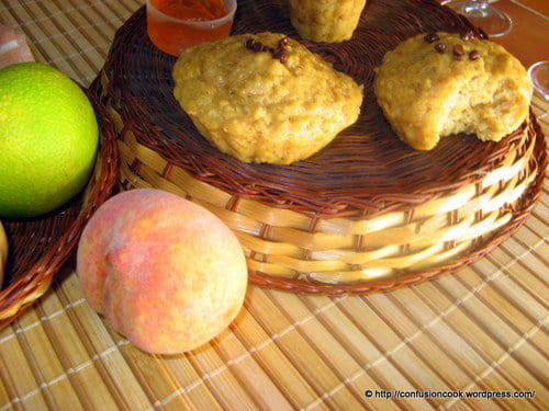 Close-up view of eggless banana peach muffins with a golden-brown crust