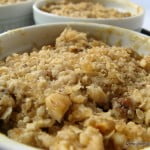 Crispy crumble topping over juicy apple and pear filling