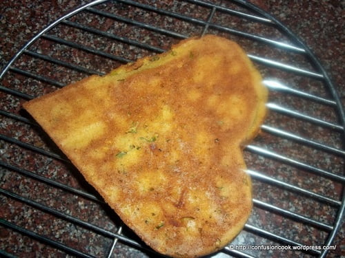 Close-up view of heart shaped eggless mango cake
