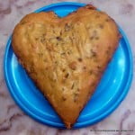 Close-up view of heart shaped eggless mango cake