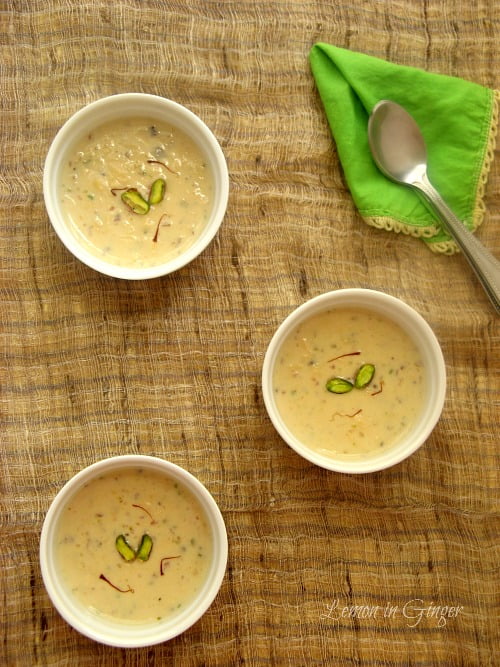 Close-up of creamy Basundi with saffron threads on top