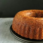 Eggless Whole Wheat Christmas Bundt Cake with a glaze drizzled over the top