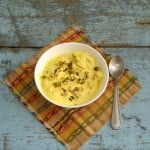 Close-up of a bowl filled with creamy Kesar Shrikhand garnished with saffron strands