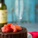 A whole gluten-free amaranth chocolate cake decorated with pear