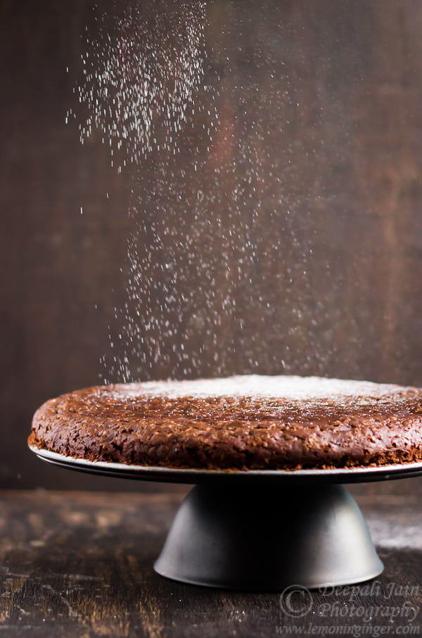 Top view of the Eggless Chocolate Wine Cake with a dusting of powdered sugar