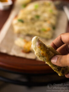 A slick of Dominos style cheesy breadsticks