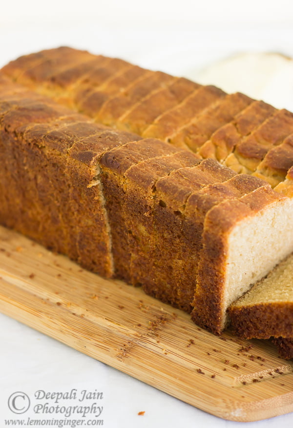 Close-up view of slices of whole wheat bread loaf kept on a tray