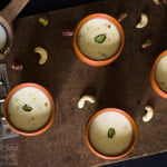 Close-up of a glass of Kadha Doodh (Masala Milk) with a rich, creamy texture