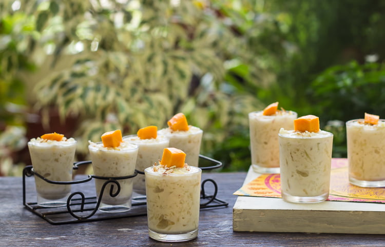 Close-up of creamy pineapple pudding garnished with fresh pineapple slices