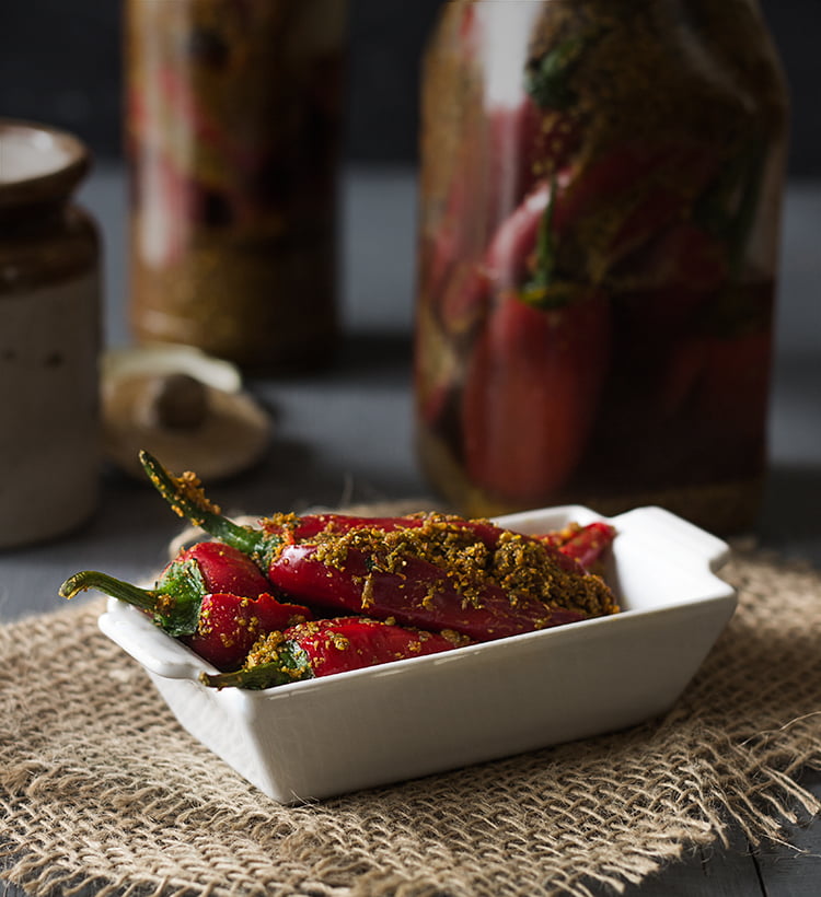 Top view of Bharwan Lal Mirch ka Achar, displaying the stuffed red chilies