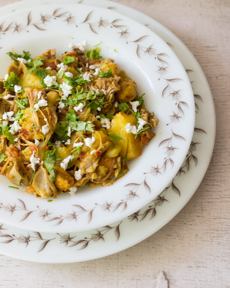 Non-veg style kathal ki sabji topped with grated cheese