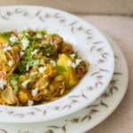 Non-veg style kathal ki sabji topped with grated cheese