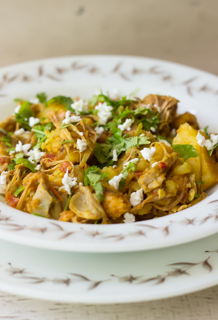 Close-up of tender pieces of jackfruit in a rich, flavorful gravy