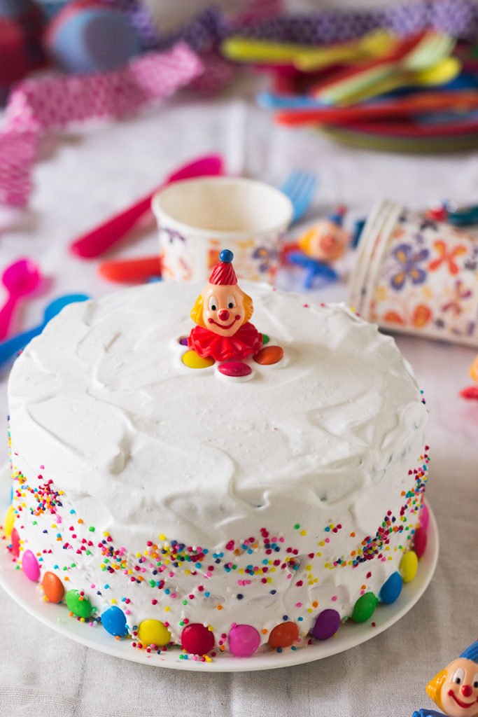 Delicious Rainbow Checkerboard Cake served on a plate