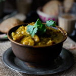 Close-up shot of Mathura ke Dubki Wale Aloo with rich, spicy gravy