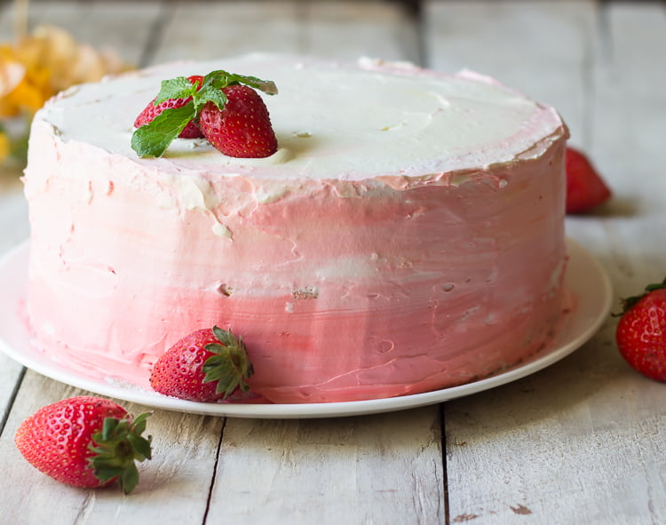 Beautifully decorated Eggless Strawberry Ombre Cake ready to be served
