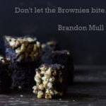 A plate of freshly baked Healthy Spinach Ragi Brownies topped with nuts