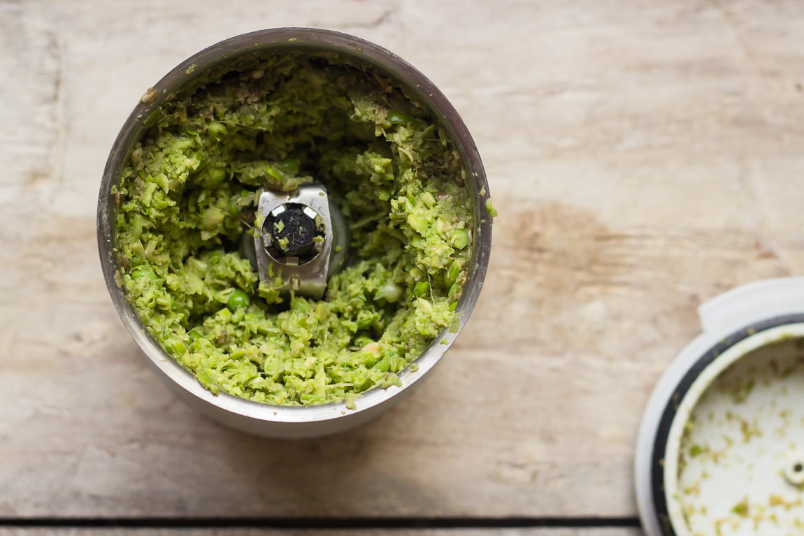 Vegetables being grinded to make delicious Undhiyo
