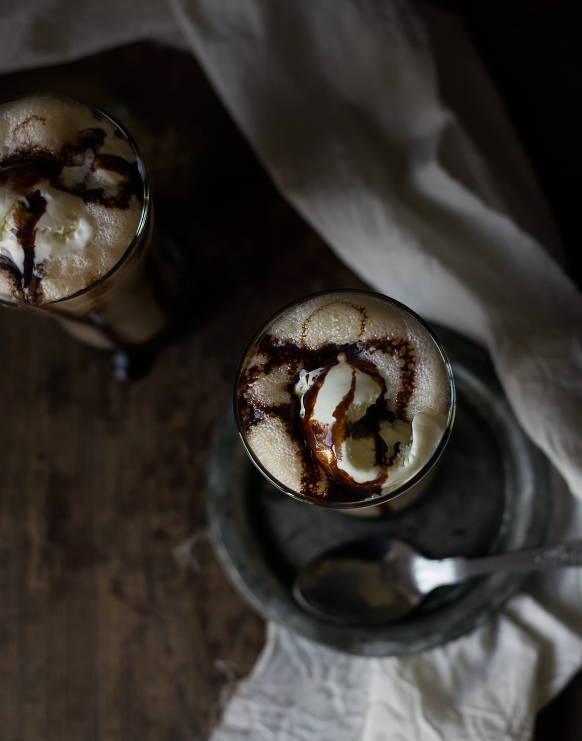 Iced coffee frappe garnished with chocolate syrup