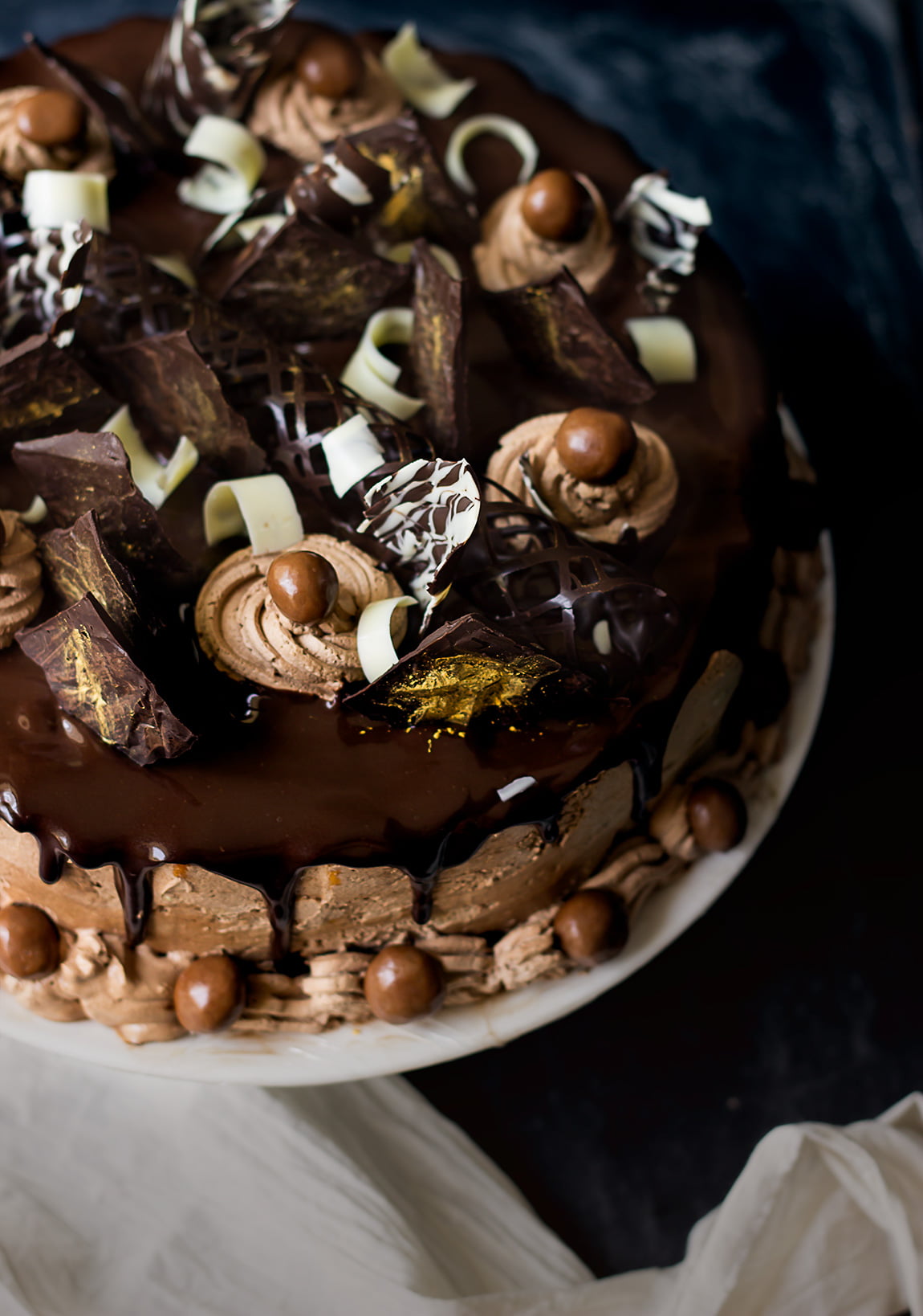Pressing the chocolate-biscuit mixture into a lined cake tin