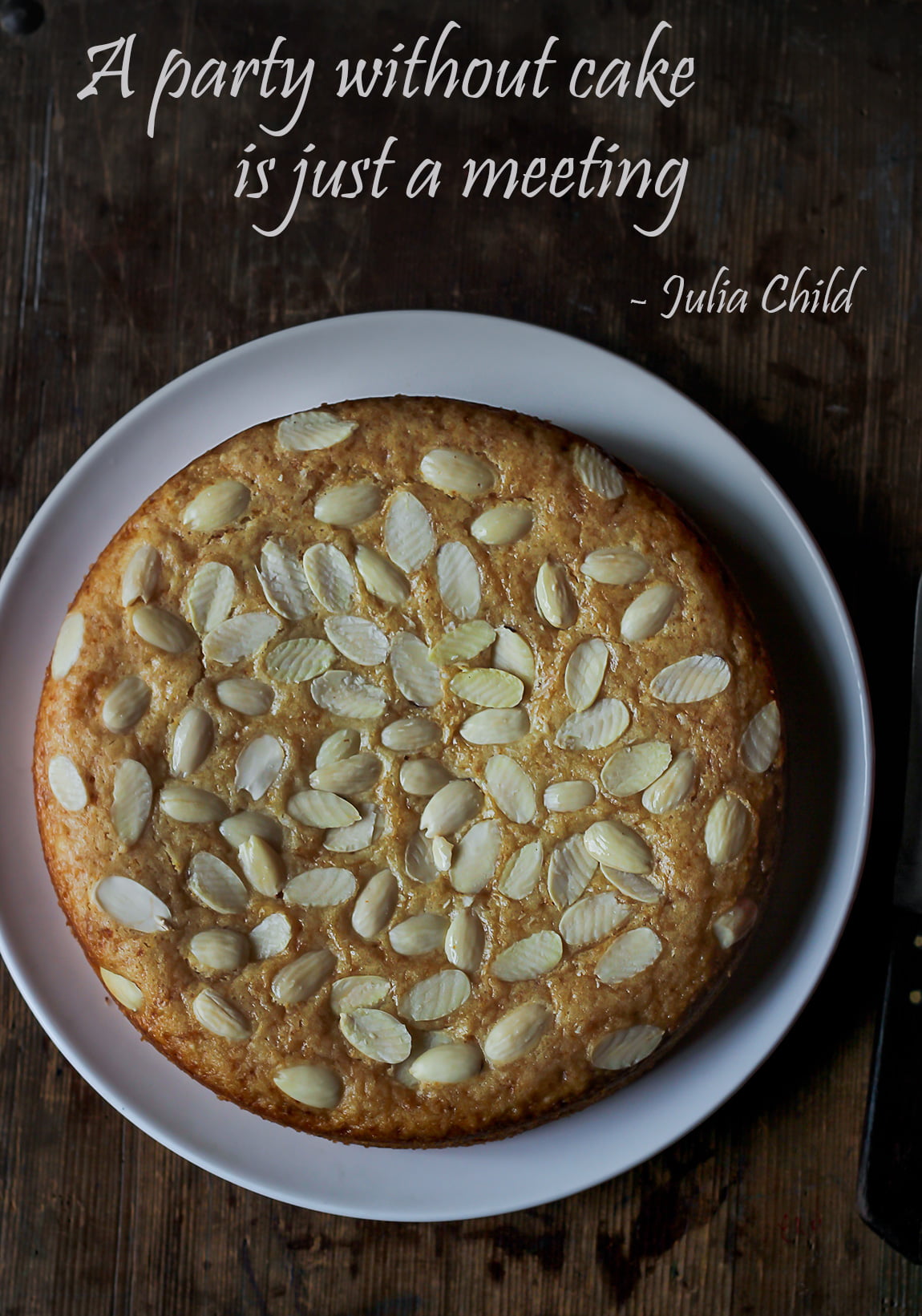 A beautifully decorated Eggless Kaju Cake topped with almonds