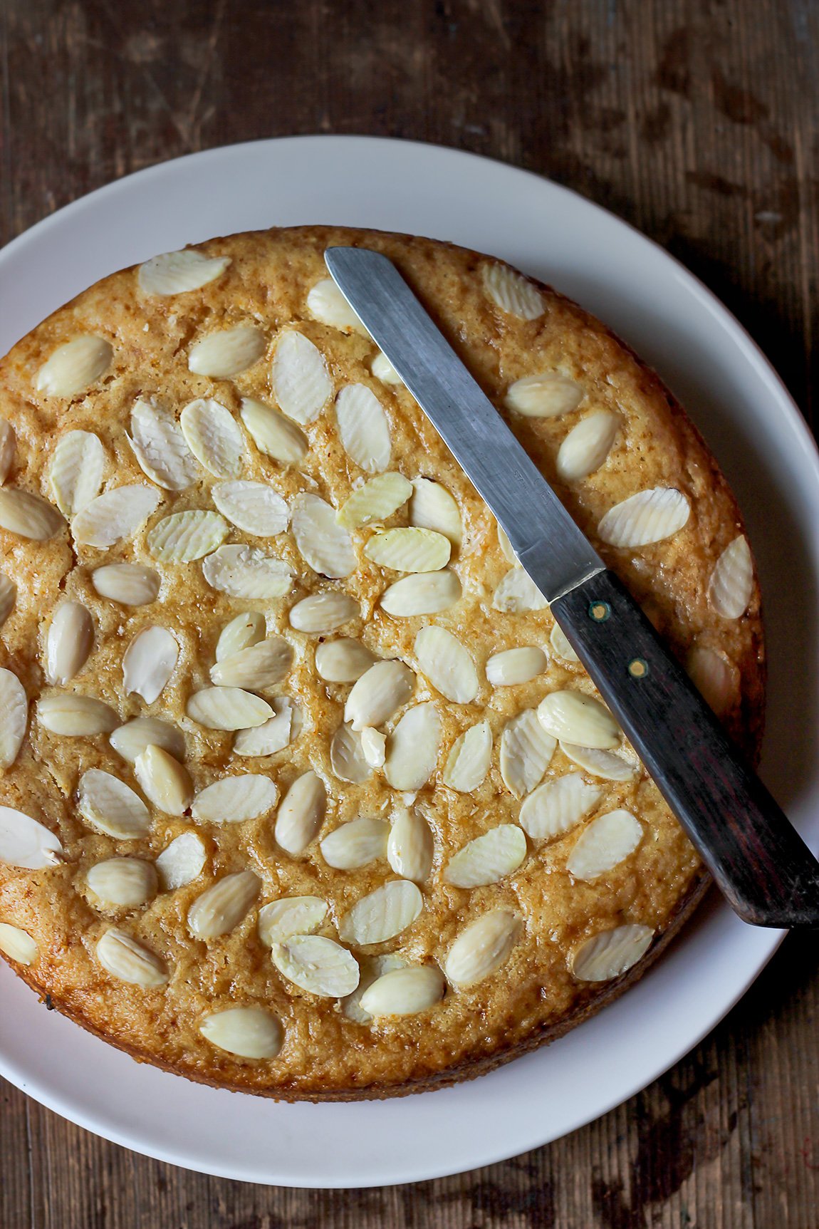 Moist and fluffy Cashew cake topped with almonds
