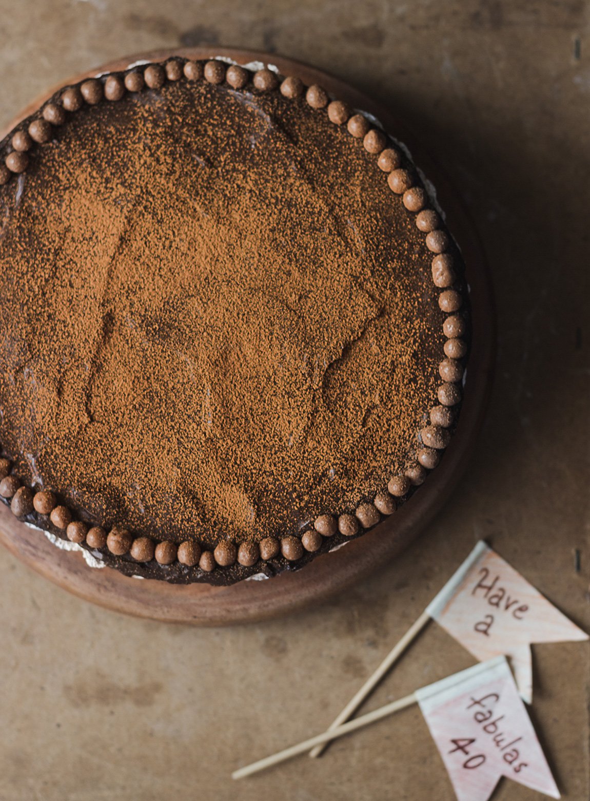 A beautifully presented No-Bake Chocolate Mousse Cake on a cake stand