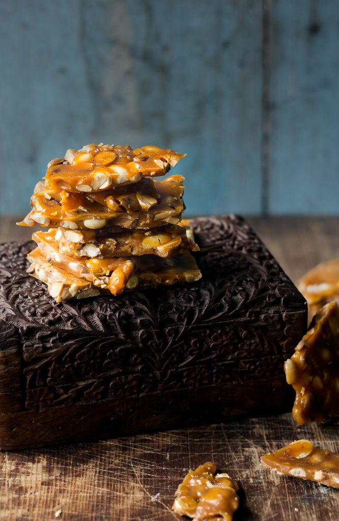 Freshly made peanut chikki broken into crispy shards