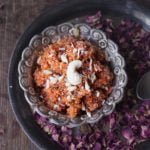 Close-up shot of the rich, creamy texture of Gajar ka Halwa, with visible carrot strands and nuts