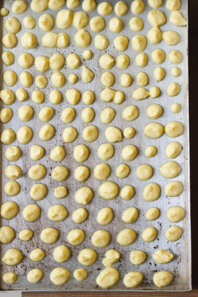 Moong Dal Mangodi spread in a tray in a circular shape