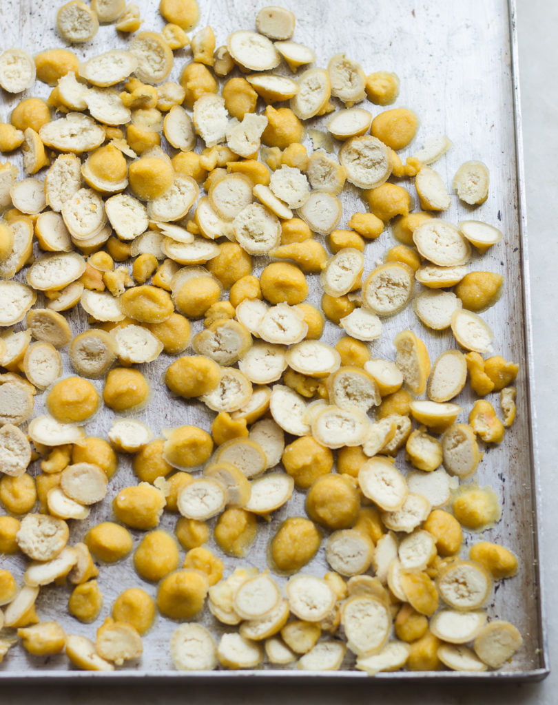 Close-up of Moong Dal Vadi showing the texture and color of the sun-dried pieces