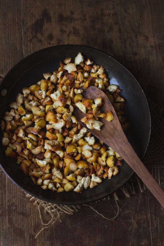 Homemade Moong Dal Mangodi, golden and sun-dried, fried in a pan