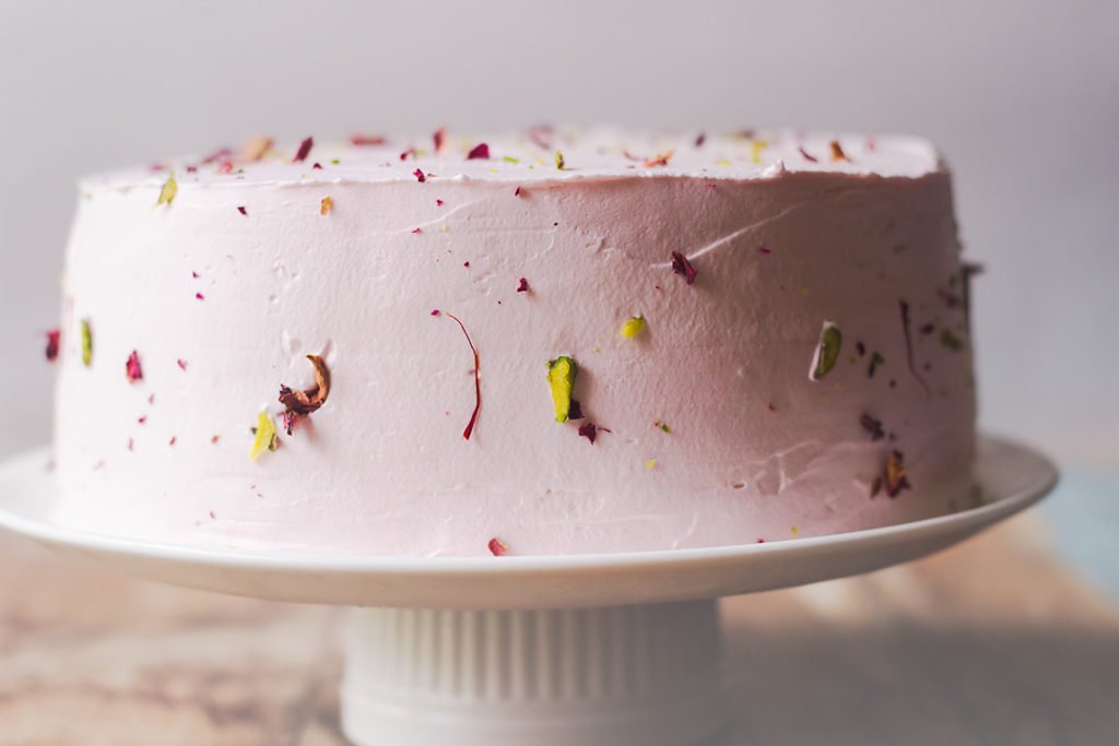 Moist and fluffy rose cake topped with almonds