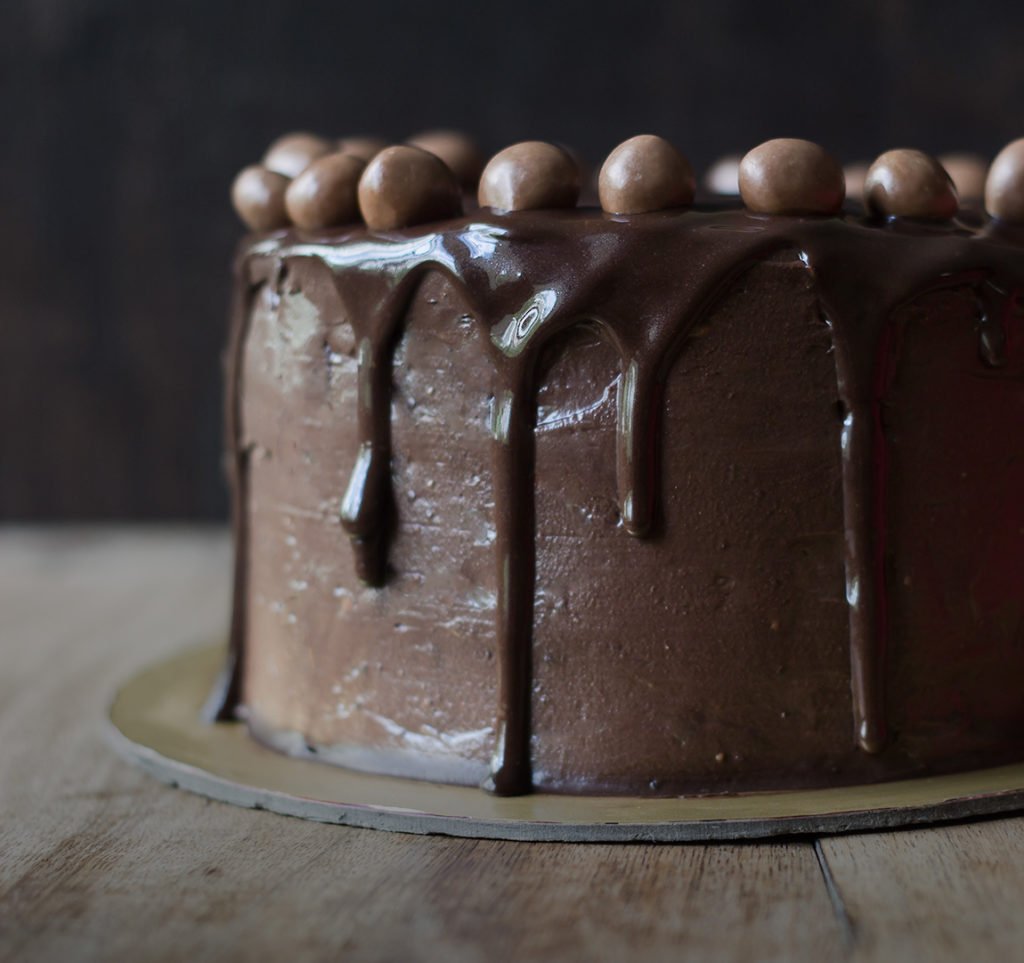 A freshly baked Old Fashioned Chocolate Cake served on a plate