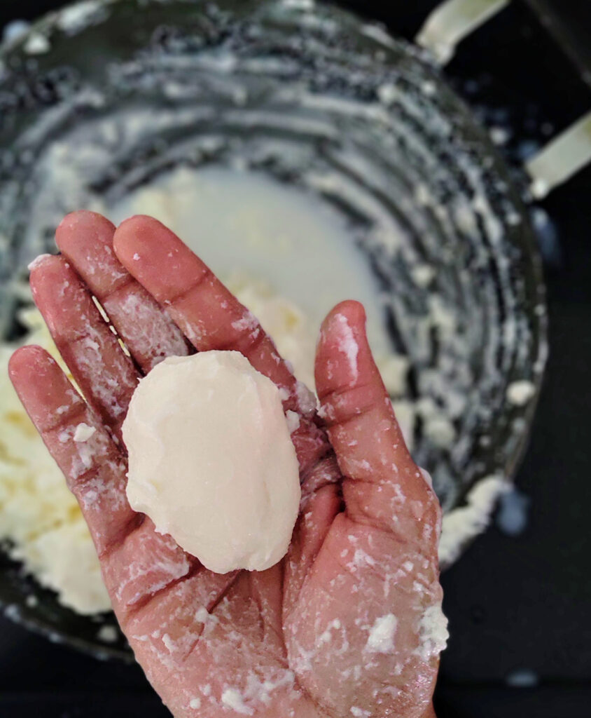 A ball of clarified butter showcasing its smooth texture