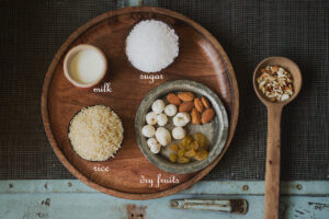 Ingredients placed in plate to make rice kheer