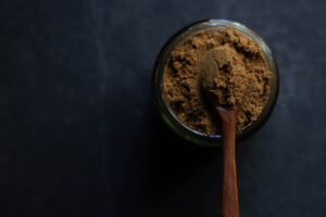 A jar filled with homemade garam masala, ready to be stored