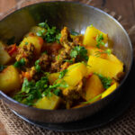 A bowl filled with Jain style Aloo Wadi or Uradi Ki Subzi
