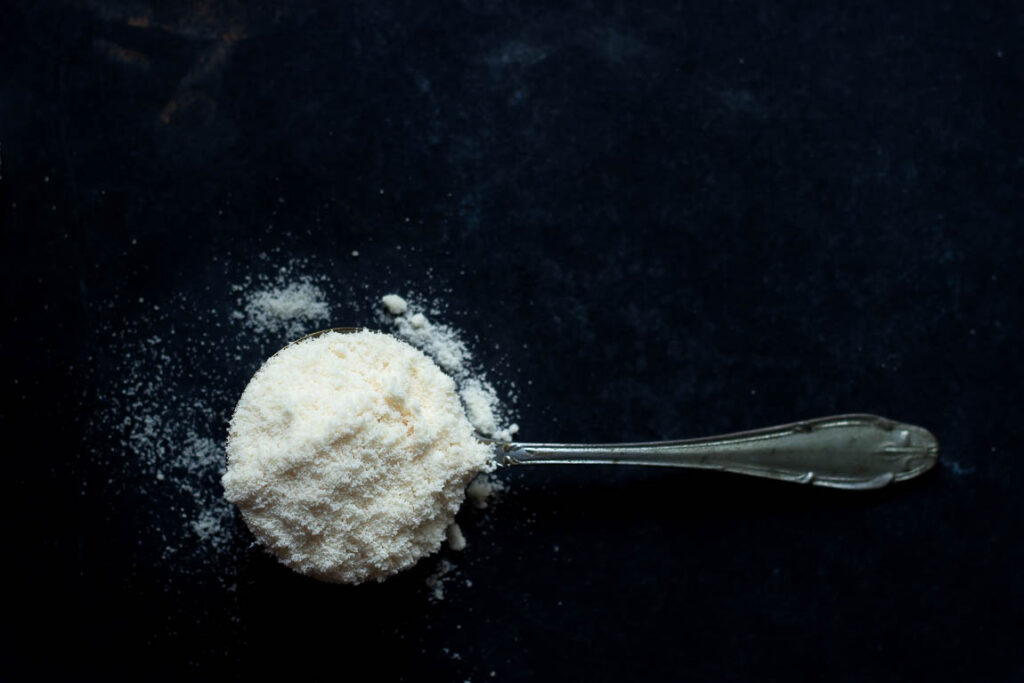 Desi Khand in a spoon highlighting it as one of the best sugar alternatives