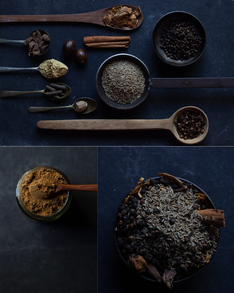Spices being measured out for a homemade garam masala spice blend
