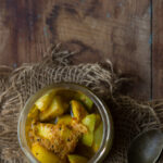 Top-view of spicy and tangy mango pickle in a jar