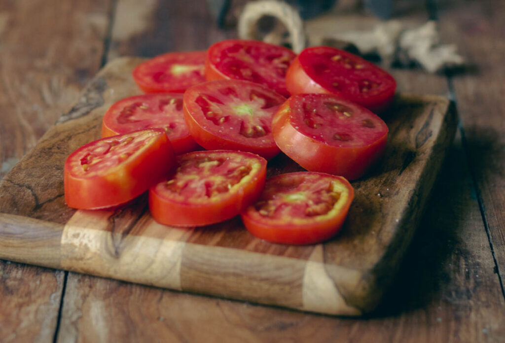 salted tomatoes ready for sundrying